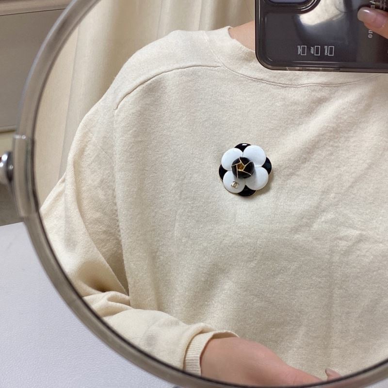 Ch*el brooches